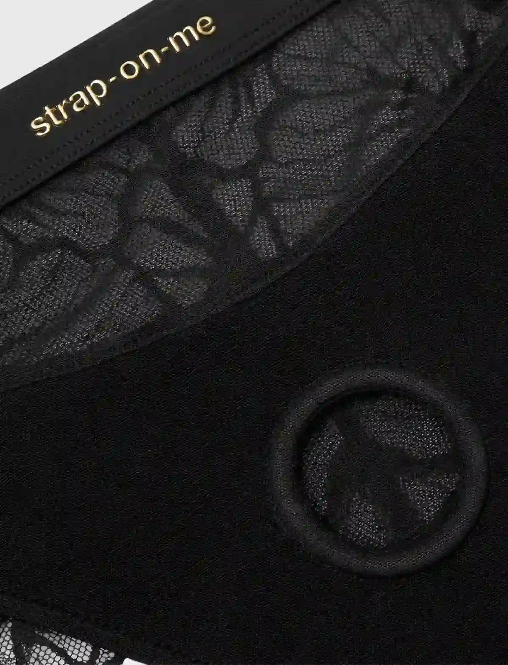 Central ring and fabric detail of the Sublime black lingerie harness – strap-on-me®